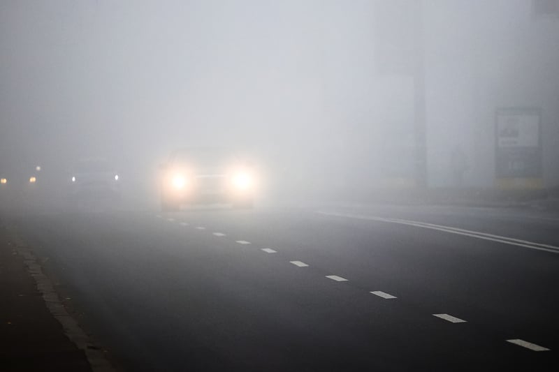 Cars driving in fog