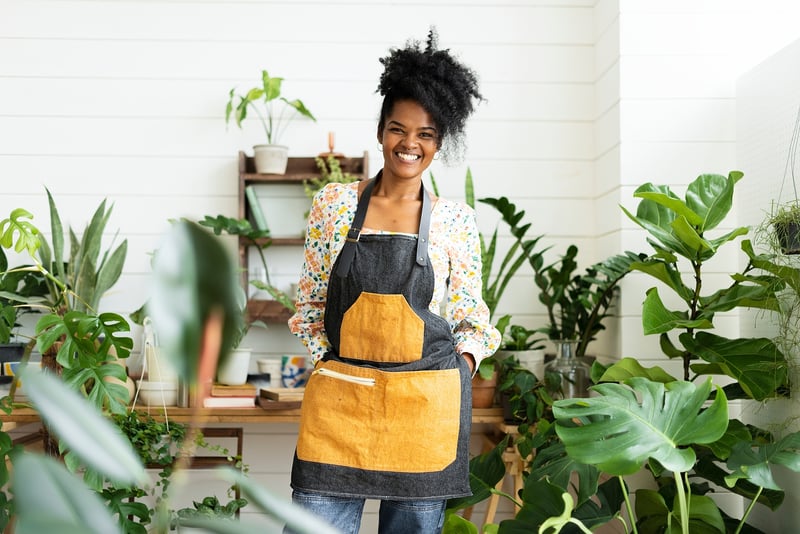 woman plant shop owner