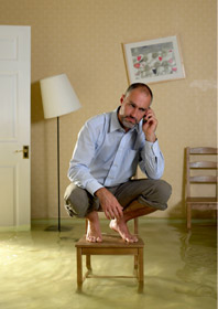 man in flooded room